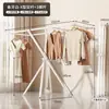 Tendedero plegable para uso doméstico, tendedero de piso para balcón, tendedero simple para viviendas de alquiler, no requiere instalación, una herramienta mágica para secar edredones