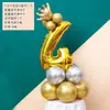 La ceremonia del primer cumpleaños se organiza con globos digitales de película de aluminio de 32 pulgadas para expresar la fiesta de cumpleaños y se solicitan globos decorativos en el camino de la boda.