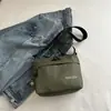 Bolso bandolera deportivo sencillo para hombres y mujeres, mochila pequeña nueva de cuadros, bolso de hombro casual para el trabajo para parejas, bolso de moda para hombre