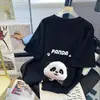 Camiseta de manga curta feminina primavera e verão 2024 nova gola redonda solta curinga comprimento médio manga curta top branco ins moderno