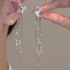 Llegada de la Diosa Luna Zircón Lunar Super Brillante Cadena Larga de Borlas Ear Cuff Sin Perforación Diseño de Nicho Pendientes Elegantes