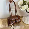 Bolsa de Mão Casual Retro Popular Transfronteiriça Feminina 2025 Nova Mais Vendida Bolsa de Ombro de Grande Capacidade Versátil Bolsa de Axila