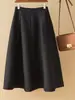 Falda media caqui para mujer otoño e invierno nuevo estilo europeo estilo Hepburn cintura alta adelgazante línea A falda paraguas longitud media falda plisada