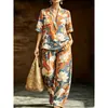 Conjunto casual de 2 peças para mulheres, estilo europeu e americano, com decote em V e estampa geométrica, apresentando calças de perna larga com corte solto, disponível para vendas transfronteiriças