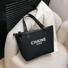 Bolsa de Cosméticos Versátil de Moda Transfronteriza Bolso de Mano Simple Portátil para Salir Bolso Grande de Capacidad para Mujer Bolso de Tocador de Fragancia Pequeña Europeo y Americano