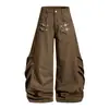 Pantalones de pernera ancha tipo cimitarra marca de moda ropa de hombre diseño plisado sentido de la moda hebilla de avión de metal personalidad nicho sueltos curvos largos