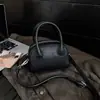 Bolsa Feminina de Ombro Cruzado Versátil Retro Design Nicho Textura de Lichia Luxo Leve Commute Verão 2026