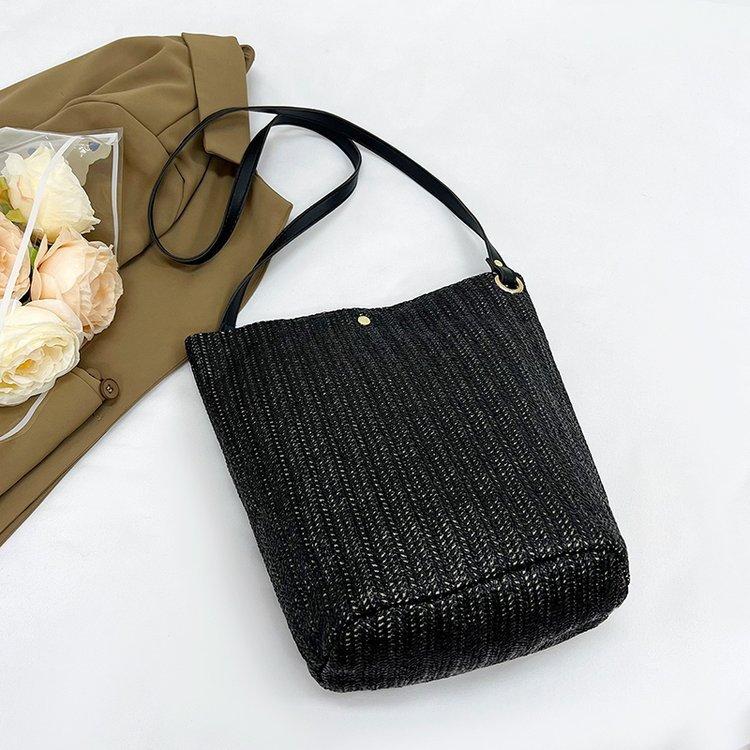 编织包女包新款潮2024夏草编简约百搭小清新水桶包个性单肩斜