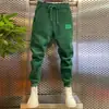 Verano 2023 nuevos pantalones casuales de malla para hombre, combinan con todo, con cordón en el tobillo, pantalones deportivos, marca de moda, pantalones de chándal para jóvenes