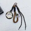 Novo Pingente de Rosca de Couro PU da Huayang Bolsa Chaveiro Lanyard de Telefone Acessório Decorativo Trançado