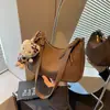 Bolso de Hombro Retro de Gran Capacidad a la Moda para Mujer 2026 Nuevo Bolso Simple Casual Tipo Dumpling Estilo Coreano de Hombro Único o de Mano para Mujer