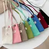 Bolsa Pequeña de Punto Color Sólido Estilo Ins Nicho 2026 Nueva Versión Coreana Bolso Cruzado Simple Mini para Viajes Diarios Teléfono y Billetera