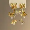 Brincos de borla de pétala de rosa femininos vintage luz luxo elegante high-end sentido brincos atmosfera exagerada sentido rosto pequenos brincos