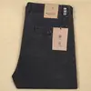 Estación Europea Otoño e Invierno Nuevos Pantalones Casuales Gruesos Rectos Sueltos para Hombre Lavados Viejos No Elásticos de Gama Alta