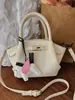 Bolso de Mujer Transfronterizo 2026 Nueva Temporada Primavera/Verano con Acabado de Alta Gama, Moderno y Súper Popular, Gran Capacidad, Bolso Cubo de Hombro y Cruzado a la Moda