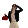 Chaqueta cárdigan negra 2026 nuevo suéter de moda de otoño para mujer principios de otoño estilo coreano prenda exterior top de punto
