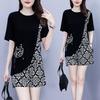 Moda Elegante para Pessoas Plus Size que Reduz a Idade Conjunto de Duas Peças com Estampa Floral Costurada Top Soltinho e Shorts Terno de Verão para Mulheres com Efeito Emagrecedor de Alta Qualidade