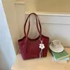 Bolso grande de Shuai Mi Jia para mujer 2026 nuevo bolso de hombro de nicho para el trabajo para estudiantes universitarios que van a clase bolso tote