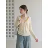 Cárdigan fino y holgado de color amarillo cremoso con botones y cuello en V para mujer, protección solar, top holgado y casual de manga larga para otoño-verano 2026