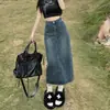 Verano 2023 nuevo diseño dividido Falda de mezclilla para mujer cintura alta cubierta línea A cadera falda longitud media