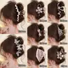 Elegante pinza de garra retro versátil, pinza de tiburón floral de lujo ligero primavera/verano, nuevo accesorio para el cabello de pinza de garra dulce y simple 2026