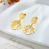 Moda de nicho pendientes simples retro de alta calidad creativos de hoja hoja pendientes huecos dorados de acero de titanio