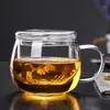 Suministro transfronterizo vaso de agua de vidrio de borosilicato alto oficina taza de té de vidrio transparente redonda divertida separación de té y agua taza de tres piezas
