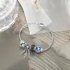 2025 Nuevo Azul Oscuro Ojo de Gato Grande Brillo Glaseado Estrella Atrapasueños Borla Colgante Pulsera de Perlas