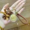 Llavero Oso Pequeño de Oro Puro 999, Llavero Oso de Hilo Muñeco 3D, Colgante de Mochila para Pareja Regalo Venta al por Mayor