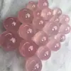 Fornecimento de fábrica bola de cristal em pó de pedra original bola de cristal em pó de Madagascar polida artesanato em pedra hibisco ornamentos de presente