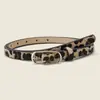 Cinto de Moda Versátil com Estampa de Leopardo Novo de Venda Quente Transfronteiriça para Mulheres, com Fivela de Pino Falsa de Alto Padrão, Cinto Fino com Corpo de Cinto de Alta Qualidade