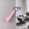 Llavero de cuerda de cuero PU de color sólido creativo de dibujos animados accesorios para bolsa de coche llavero colgante de regalo