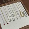 Conjunto de Pulsera y Collar de Plata de Ley 925 Más Vendido Transfronterizo, Lujo Ligero, Artesanía Exquisita, Conjunto Único de Pulsera de Trébol de Cuatro Hojas y Lazo para Mezclar y Combinar
