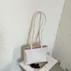 Otoño 2026 Nuevo Estilo Coreano Simple Bolso de Gran Capacidad Alta Apariencia Bolso de Hombro Único Bolso de Mano de Moda para el Trabajo y el Trayecto