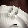 Aretes de perla con nudo tachonado de diamantes estilo francés para mujer, elegante estilo socialité, clips para orejas en espiral, aretes de diseño único y elegante