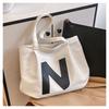 Bolsa de Lona Transfronteiriça Bolsa Tote Feminina Grande Capacidade Outono e Inverno 2026 Nova Bolsa Transversal Casual Bolsa de Aula para Estudante Universitário