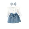 Nuevo producto de primavera y otoño para chicas europeas y americanas: top acanalado con manga de volantes y lazo y minifalda vaquera en un estilo fresco y sencillo, directo de fábrica