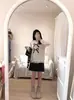 Suéter de tricô novo estilo coreano, modelagem solta, para Outono/Inverno 2026, com padrão jacquard de laços e gola redonda, top feminino