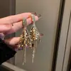 Brincos de Argola Redonda Vazada com Franjas Prateadas Europeus e Americanos Moda Personalidade Versátil Brincos Elegantes de Alta Qualidade para Mulheres