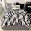 Venta al por mayor de ropa de cama de algodón bohemio de cuatro piezas, estilo japonés, pequeña, fresca, nórdica, sencilla, para familias.