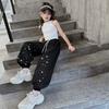 Traje para niñas Primavera y Verano 2024 Nueva Moda Niñas Estilo Coreano Niños Medianos y Grandes Celebridad de Internet Estilo Frito Chaleco Pantalón de chándal traje