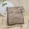 Bolsa Feminina 2026 Novo Estilo Moda Retrô Bolsa de Ombro Transversal Vanguarda para o Dia a Dia Multifuncional Simples Bolsa Mais Vendida