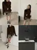 Outono 2026 Novo Suéter de Malha Feminino Top Estilo Coreano Elegante Cor Sólida Lã Pura Gola Redonda Manga Longa para Trabalho Casual Versátil