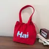 Versão Coreana Transfronteiriça 2026 Verão Nova Bolsa Tote Casual Grande Capacidade com Estampa de Carta Leve Estilo Preguiçoso Bolsa de Ombro