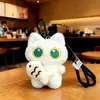 Juguete de Peluche de Gato Negro Lindo y Adorable de Ojos Grandes Sosteniendo un Pez Pequeño, Colgante para Bolso de Pareja, Llavero Creativo de Gato Negro Pequeño Manzana