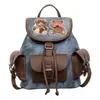 2026 Mochila Nueva Bordada de Oso para Mujer Lona Patchwork Cuero Estilo Universitario Versátil Mochila Pequeña Linda de un Solo Hombro Cruzada