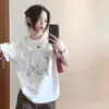 Camiseta de manga corta con estampado de gato a rayas blancas de seda de leche para hombre y mujer, nuevo estilo verano 2026, top holgado y casual de media manga