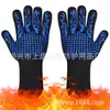 En stock resistencia a altas temperaturas 800 grados guantes para barbacoa de exterior de cinco dedos de silicona para hornear horno microondas protección de aislamiento térmico