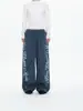 Pantalones deportivos holgados de estilo americano de moda para hombre y mujer, de corte recto y pierna ancha, con estampado de letras, casual, para jazz y hiphop