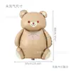 Novo Balão Urso Sentado Abraçando Bolo Filme de Alumínio Urso Estéreo 3D Balão Decoração de Aniversário Festa Layout Atacado